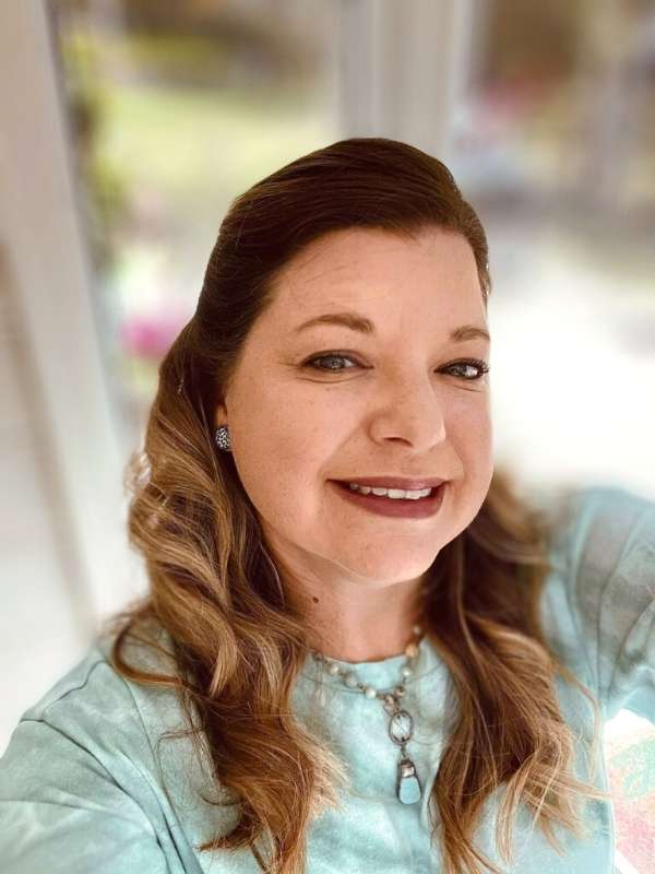 face of woman smiling, owner and author of lifestyle blog and shop The Peaceful Soul Writer